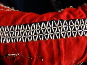 An embroidered band belonging to an Akha tunic